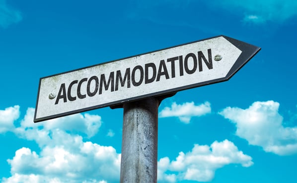 Accommodation sign with sky background