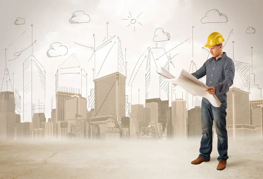 Business engineer planing at construction site with city background concept_compressed